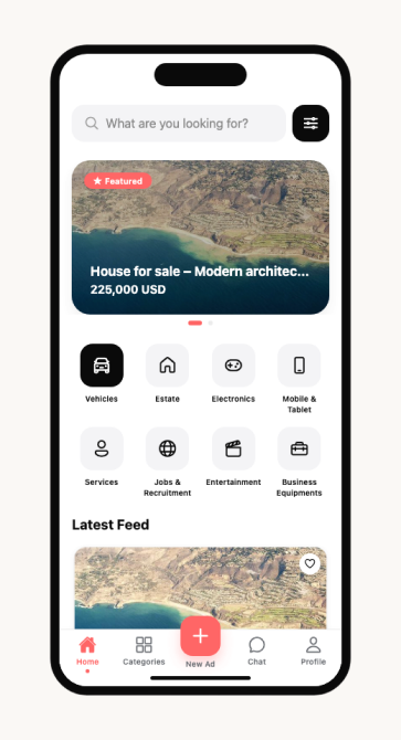 iBazzar home screen with the coral New Ad button and Chat tab always visible in the bottom bar